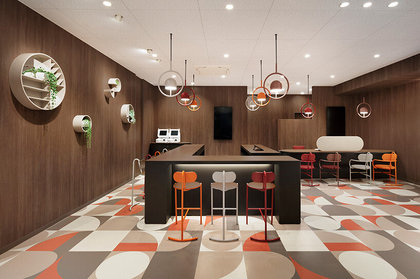 nendo unveils two-façade design for docomo, japan's largest mobile phone operator