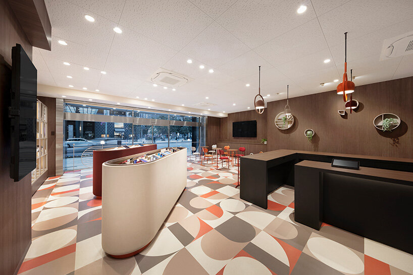 nendo unveils two-façade design for docomo, japan's largest mobile phone operator