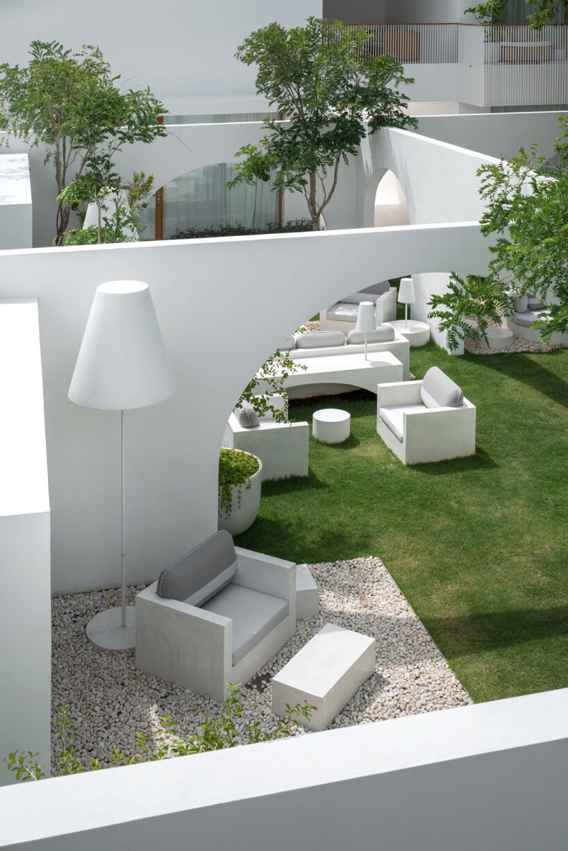 intimate courtyards form this beach resort in thailand designed by onion designboom