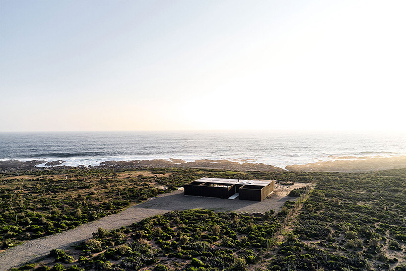 pablo saric + cristian winckler build modular holiday home in chile overlooking pacific ocean