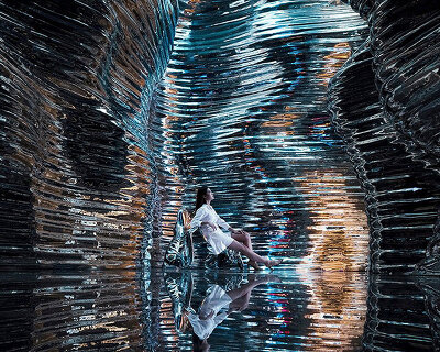 canyon-like steel interior by foshan topway design houses 'zcmetal' exhibition hall in china