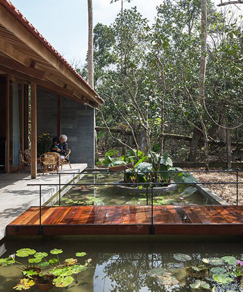 SILAA architects weaves small timber homestay into natural landscape of vietnamese village