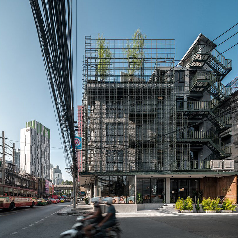 steel grids clad this boutique hotel designed by SIM STUDIO in bangkok designboom