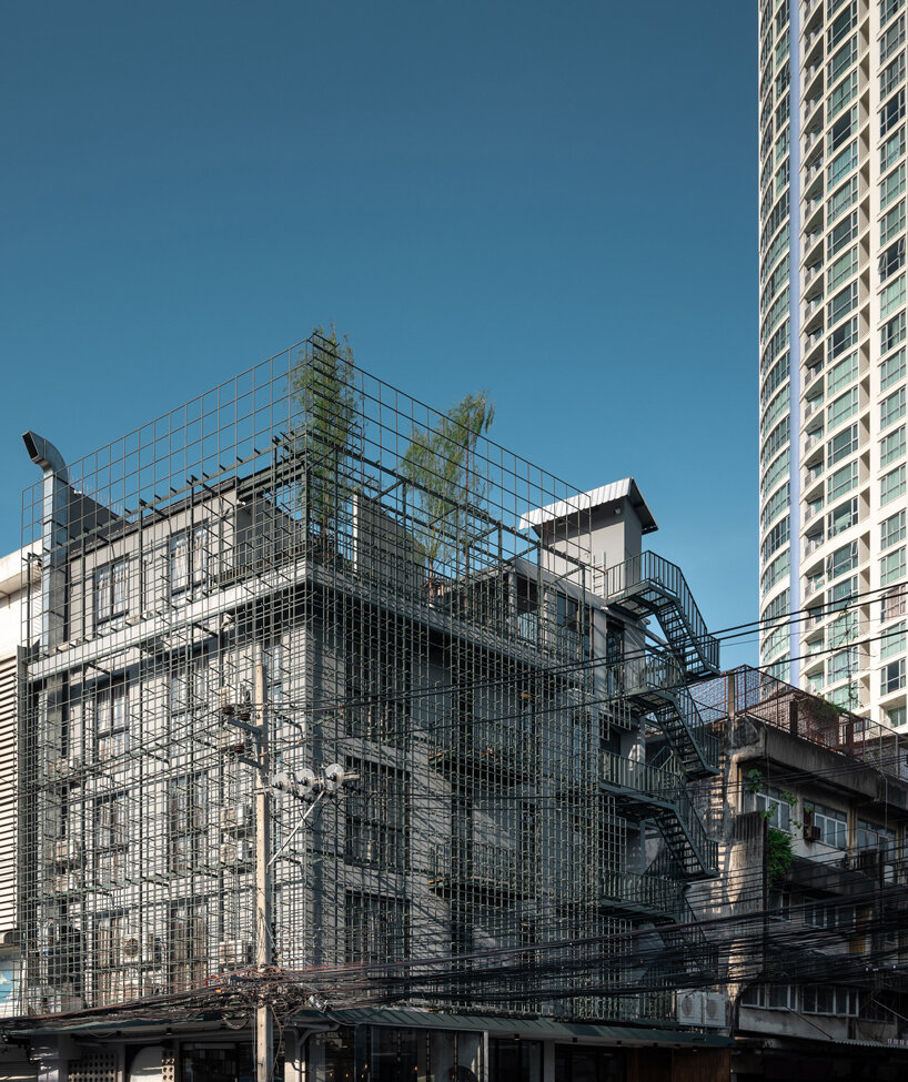 steel grids clad this boutique hotel designed by SIM STUDIO in bangkok designboom