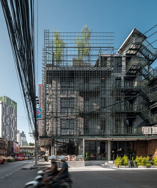 steel grids envelop this boutique hotel designed by SIM STUDIO in bangkok