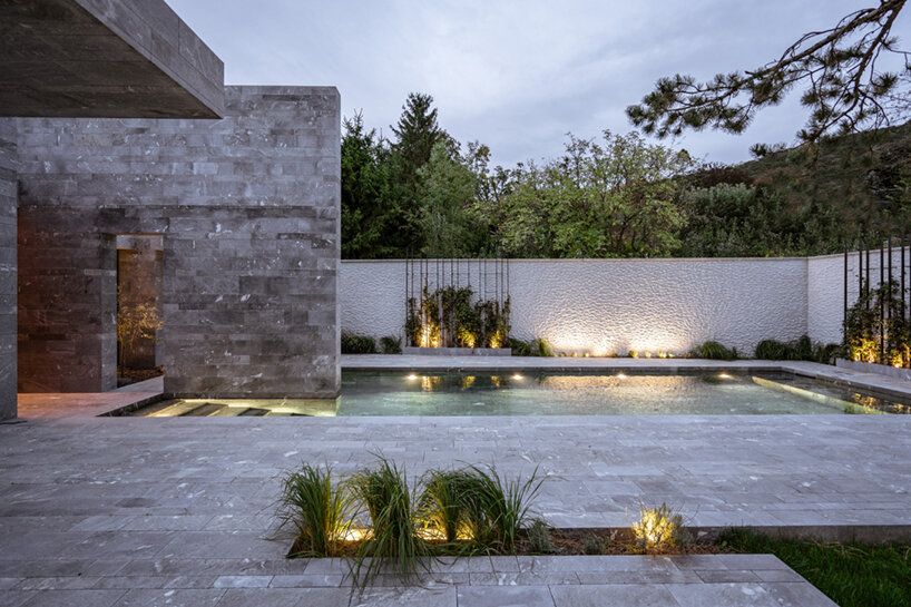 smartvoll's spa pavilion is a careful composition of monolithic stone slabs