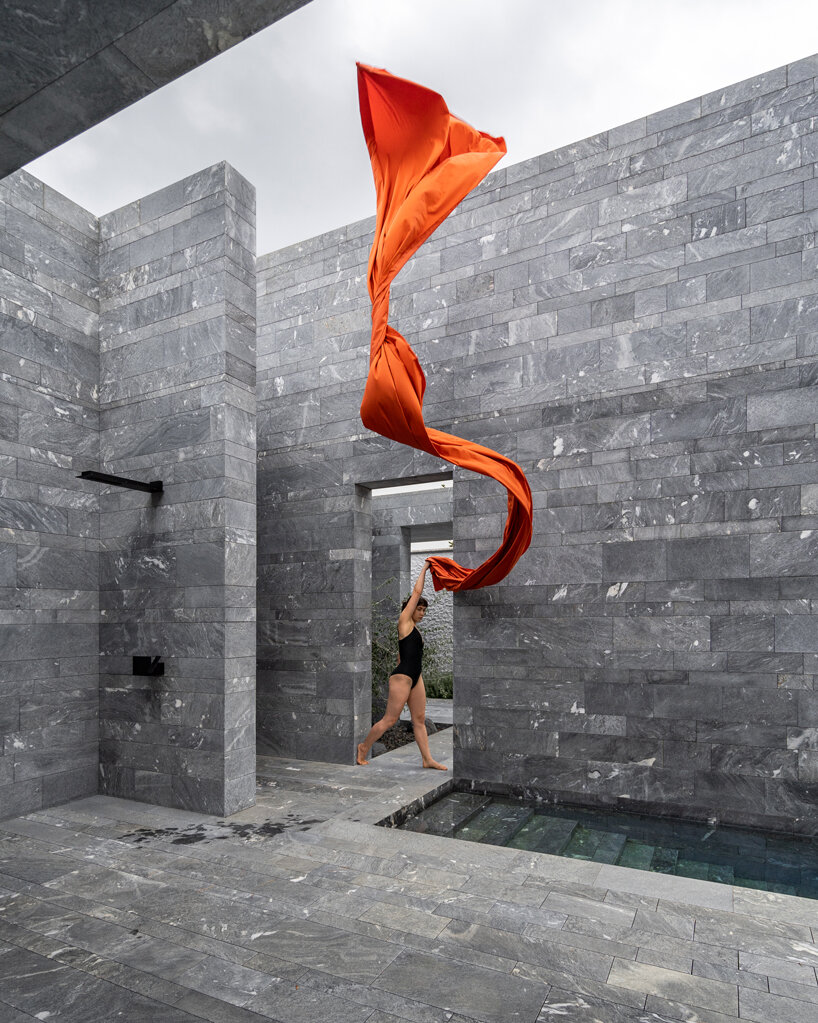 smartvoll's spa pavilion is a careful composition of monolithic stone slabs