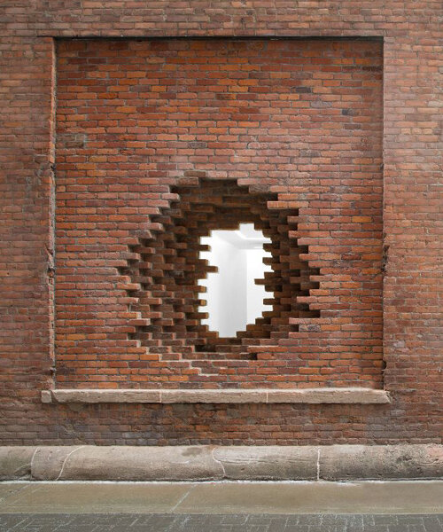 snarkitecture playfully sculpts historic detroit brickwork for library street collective gallery