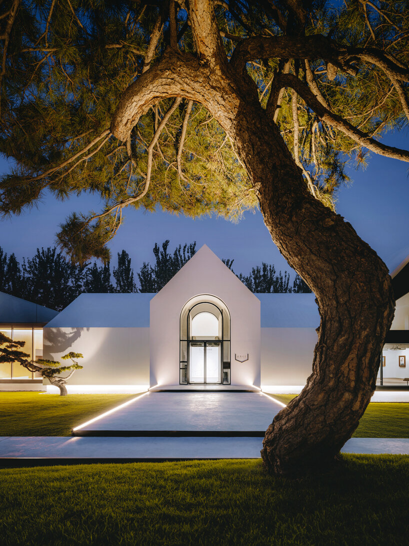 pine trees and pure geometric forms articulate 'song art museum 