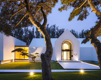 pine trees and pure geometric forms articulate song art museum in beijing