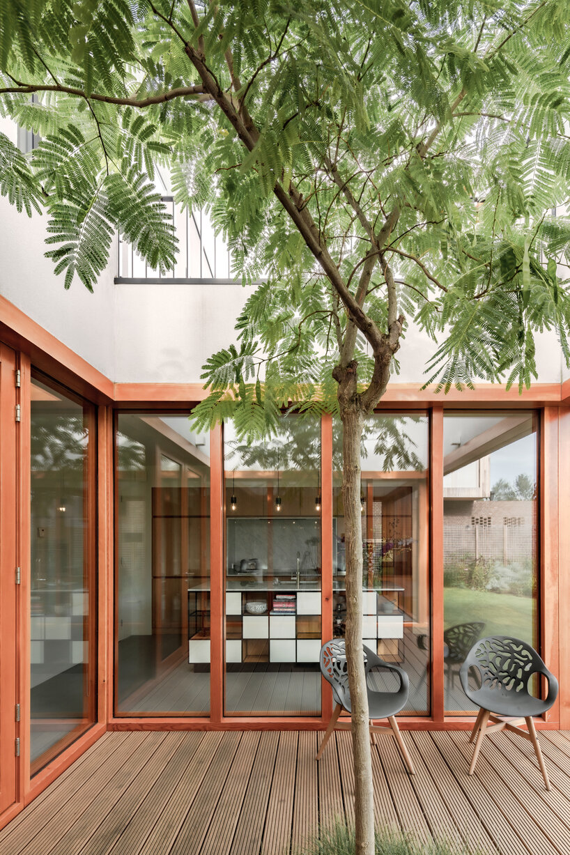 studio AAAN plans a two-story house around a central patio space in rotterdam