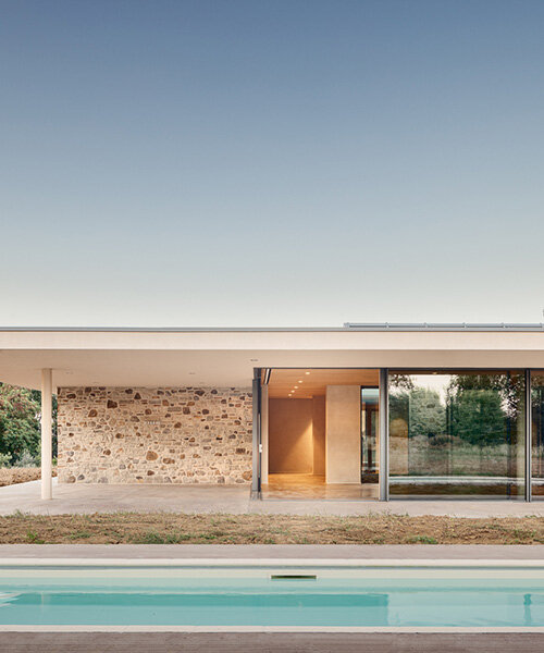 studio contini clads residential house in italy around three patios