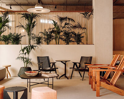 studio gameiro brings a warm and earthy aesthetic to this wellness club in lisbon