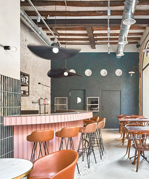 terrazzo tiles, concrete + exposed pipes decorate liat eliav's 'nina' restaurant in barcelona