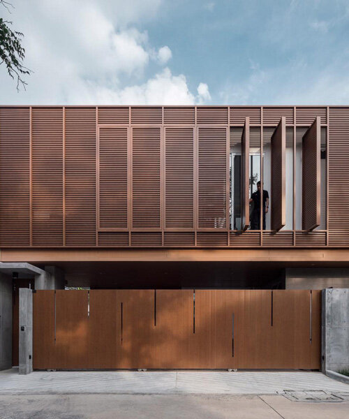 TOUCH architect conceals private courtyard behind louver façade in this house in thailand