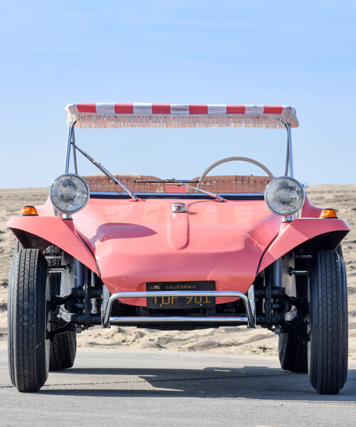 a pink volkswagen buggy has been refurbished in a vintage and beachy jolly-style