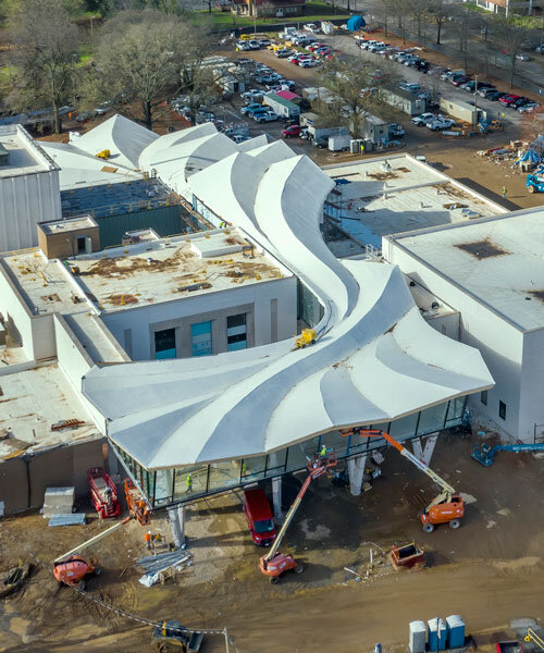 studio gang's arkansas museum takes shape with completion of signature roof