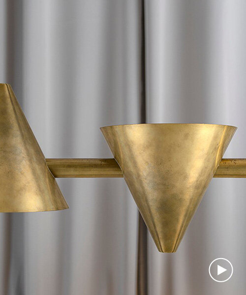 trio addi + örsjö introduce 'tell' modular cone-shaped brass luminaire