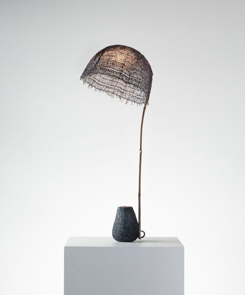 finely textured aluminum adorns A+A cooren's minimal furniture collection