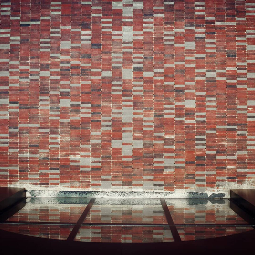 arthur-louis ignoré installs a patterned rug-like floor of bricks in rennes, france