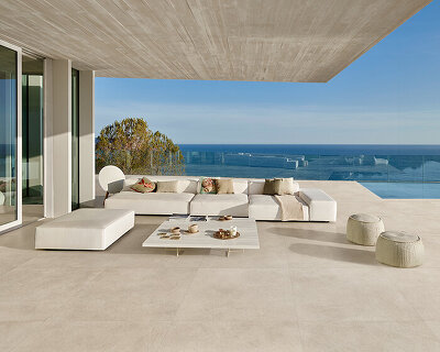 atlas concorde's hand-troweled, concrete-look tiles span in and outdoors