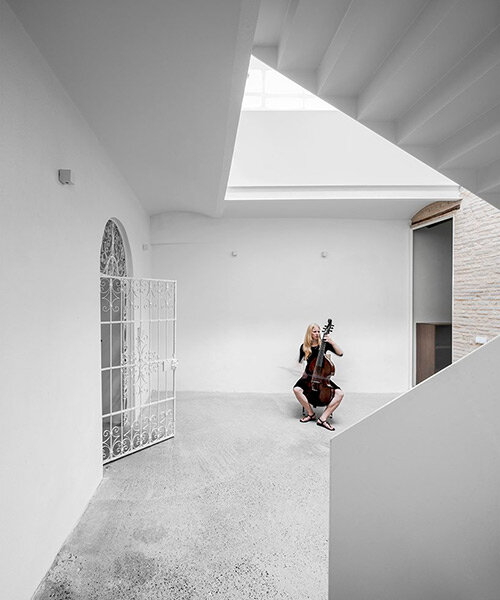 (bau)m transforms 18-century structure into contemporary house for family of musicians in spain