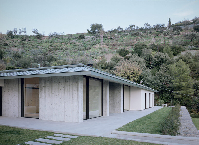 Gabion Cages Filled With Stones Support Villa Beusi's Verdant Terraces 