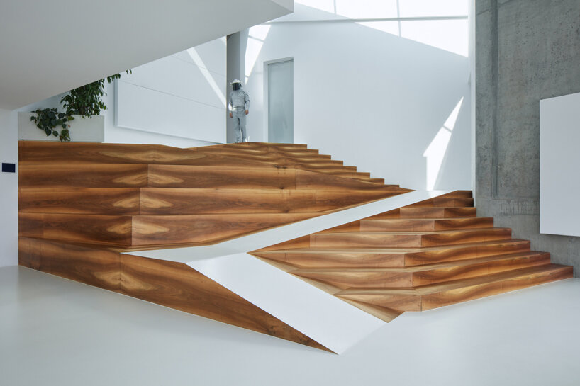 COLL COLL integrates smart technologies into a spiral-shaped villa in prague