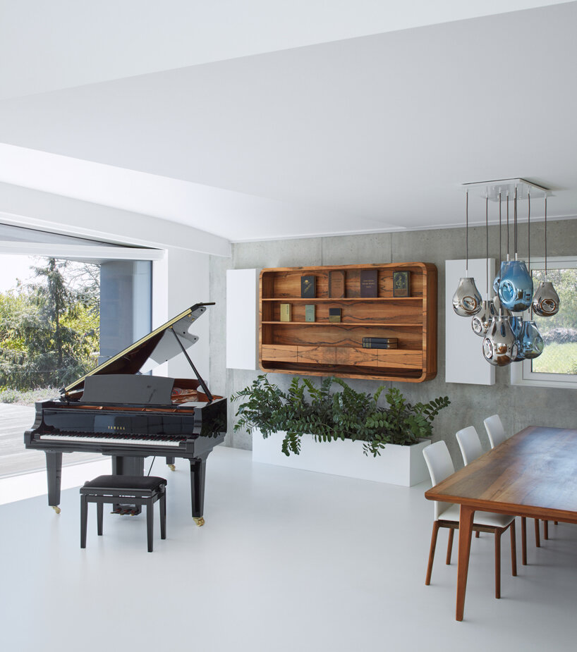 COLL COLL integrates smart technologies into a spiral-shaped villa in prague