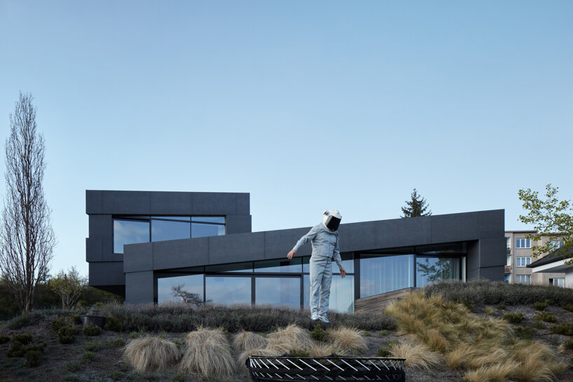 COLL COLL integrates smart technologies into a spiral-shaped villa in prague