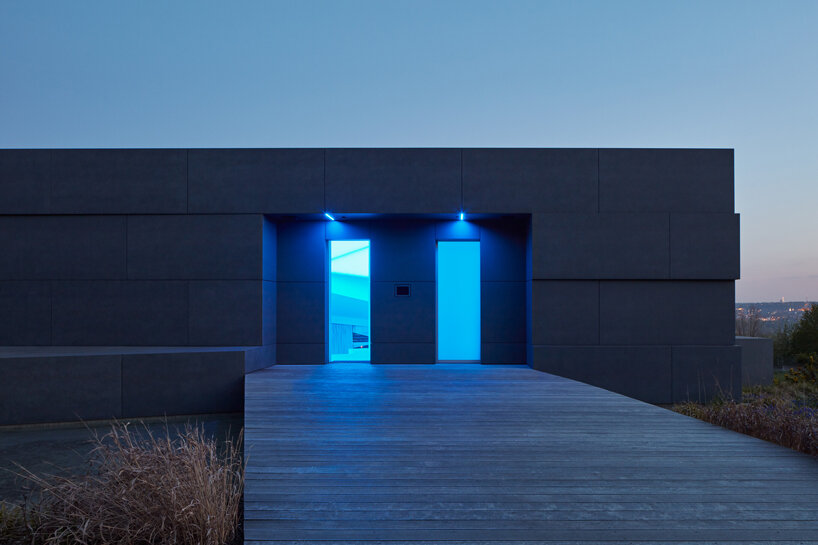 COLL COLL integrates smart technologies into a spiral-shaped villa in prague