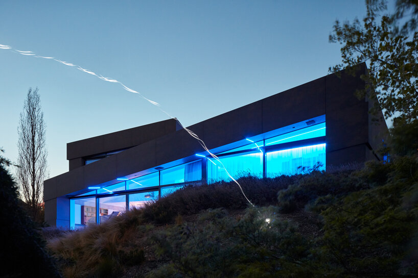 COLL COLL integrates smart technologies into a spiral-shaped villa in prague