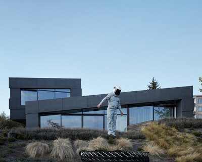 COLL COLL integrates smart technologies into a spiral-shaped villa in prague