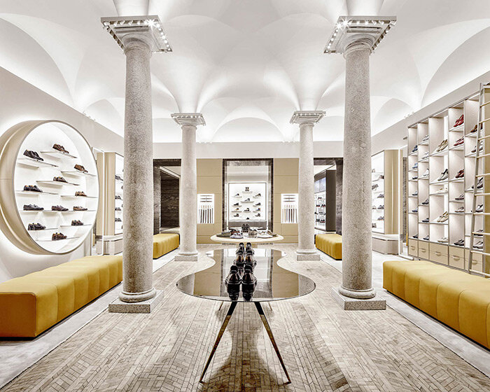 curiosity designs tod's studios in milan as an ever-changing gallery covered in travertine