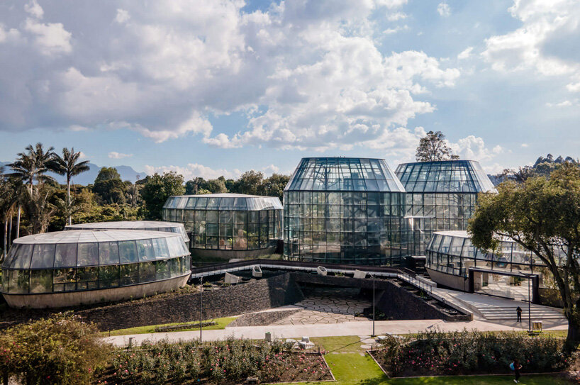 DARP blends cluster of floating glass volumes into the lush botanical garden of bogotá