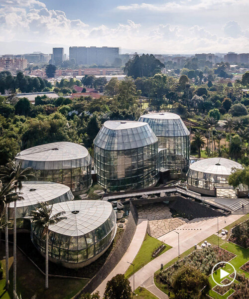 DARP blends cluster of floating glass volumes into the lush botanical garden of bogotá