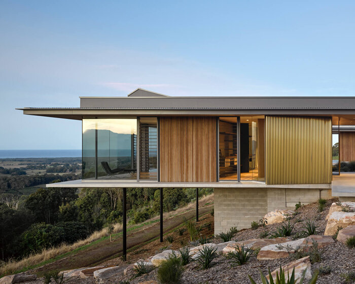 DFJ architects plans byron bay residence around a protected courtyard in australia