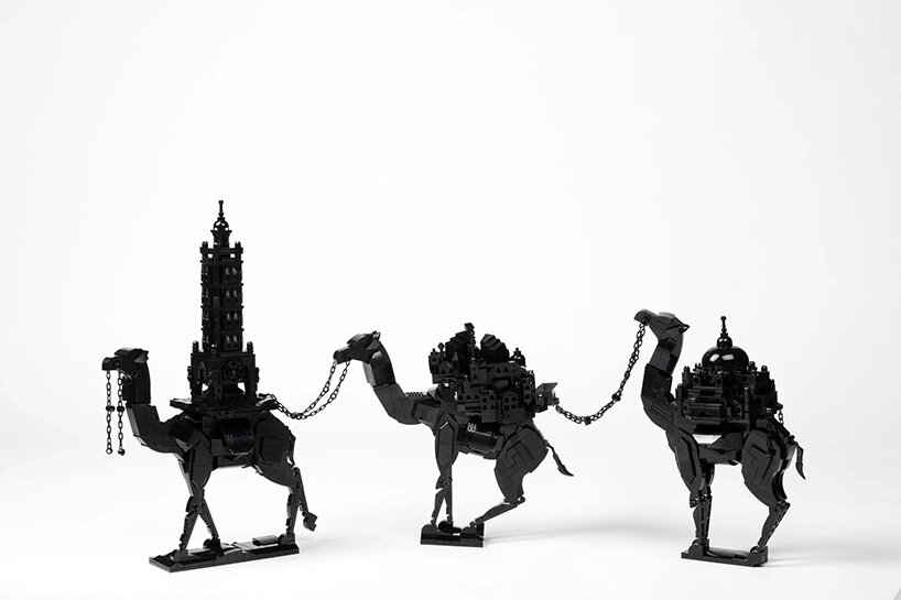 ekow nimako renders an afrofuturistic cityscape in 100,000 black LEGO pieces