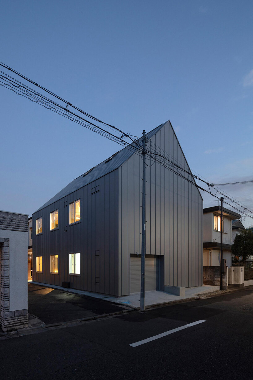 reflective curtains divide tokyo home's raw concrete interior by endo architect and associates