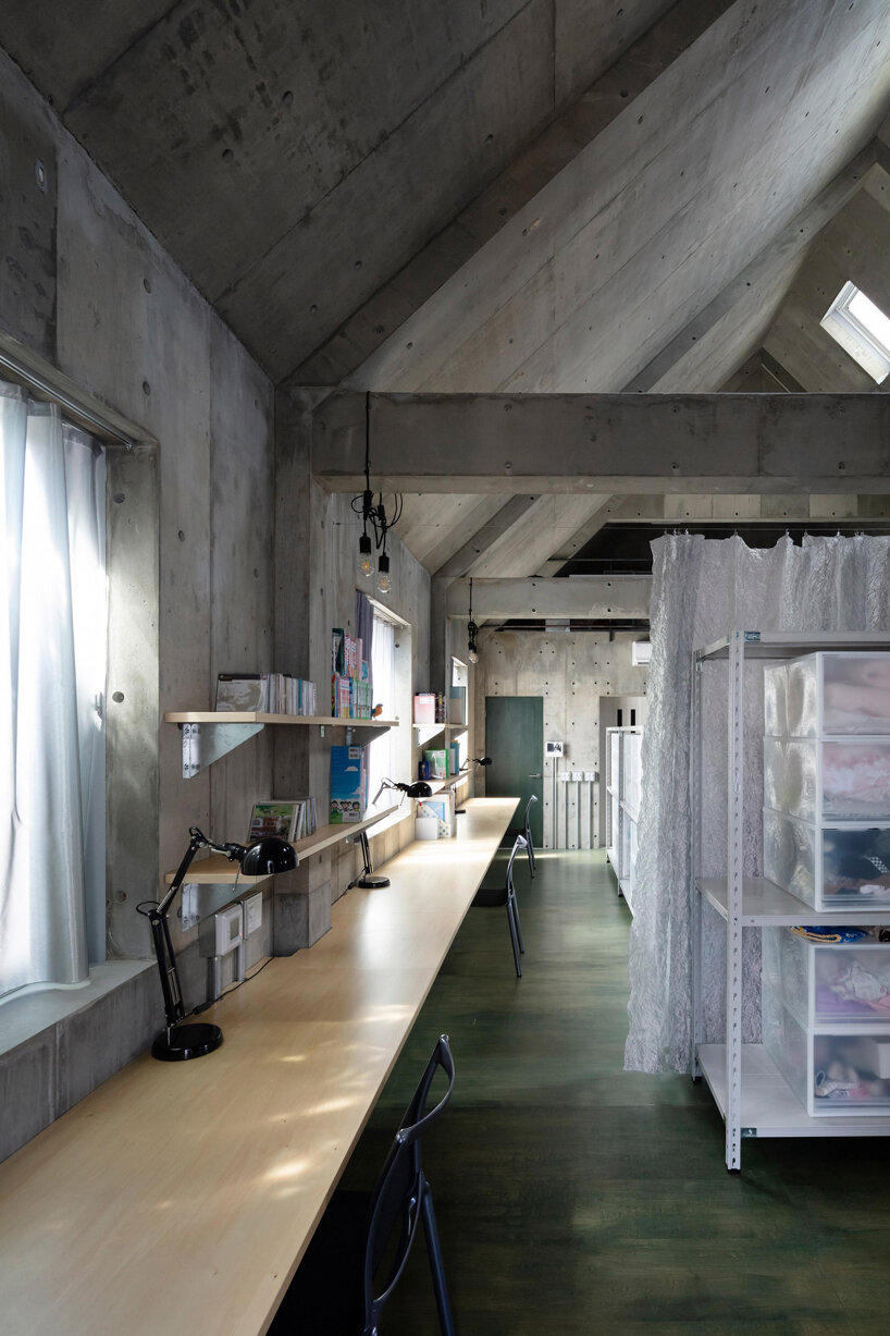 reflective curtains divide tokyo home's raw concrete interior by endo architect and associates