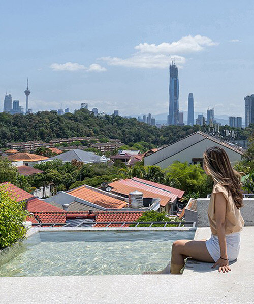 fabian tan designs rooftop viewing platform with pool on 'ottiqa house' in kuala lumpur