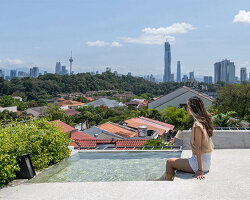 fabian tan designs rooftop viewing platform with pool on 'ottiqa house' in kuala lumpur