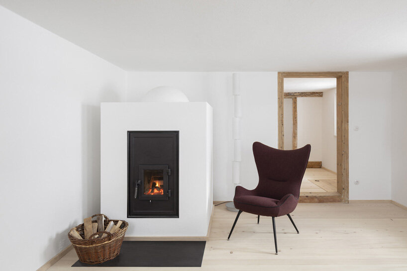 hafner bau converts historic german farmhouse into minimalist house that blends old + new