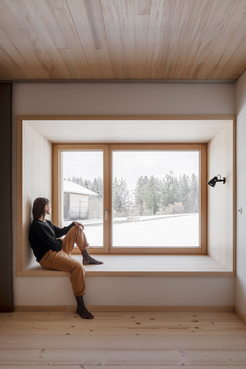 hafner bau converts historic german farmhouse into minimalist house that blends old + new