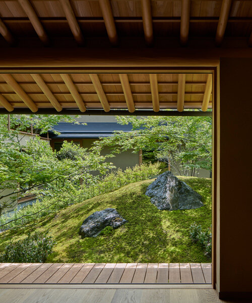 hiroshi nakamura & NAP articulate house in kyoto around courtyard with a sacred rock