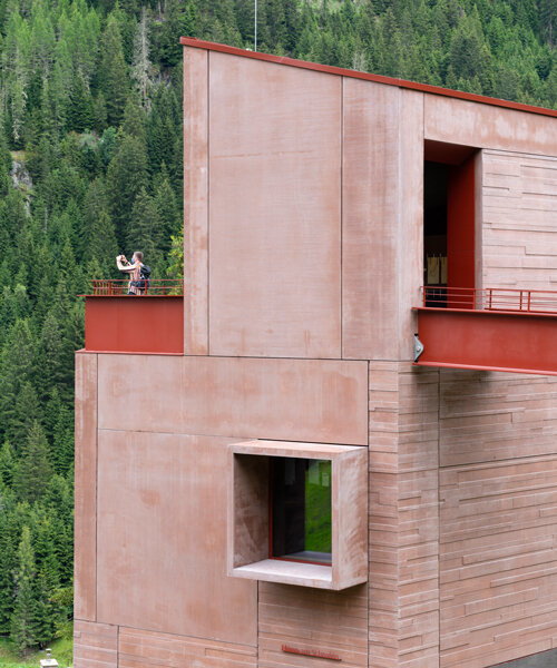 ibex museum st. leonhard echoes historic timber farmhouses with red concrete