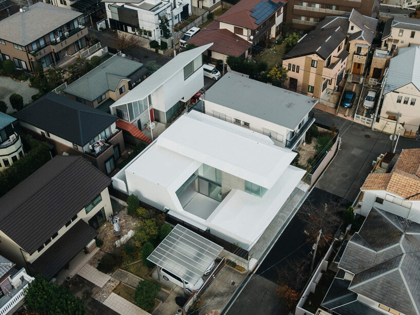 kubota architect atelier's 'ho-house' in japan combines white concrete + frosted glass
