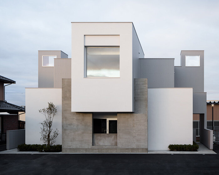 FORM / kouichi kimura combines intersecting volumes into 'landscape house' in japan