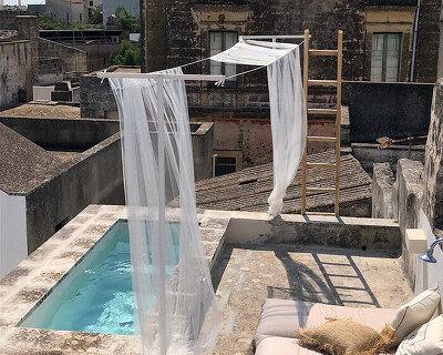 acqua di puglia adds rooftop pool in 'maison salentina' renovation within southern italy