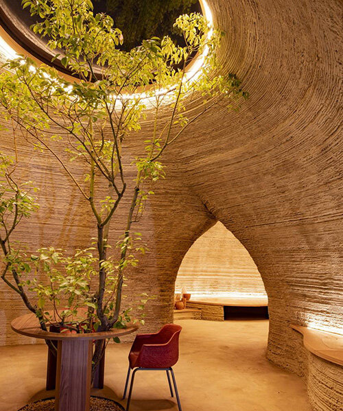 discover the interiors of TECLA, a 3D-printed home made of clay by mario cucinella + WASP